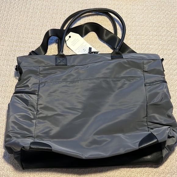 Indigo diaper bag, brand new, has cross body strap and over the shoulder straps - Picture 3 of 7